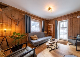 Bergmoment in Rauris, Oostenrijk woonkamer Bergmoment 40plusteens